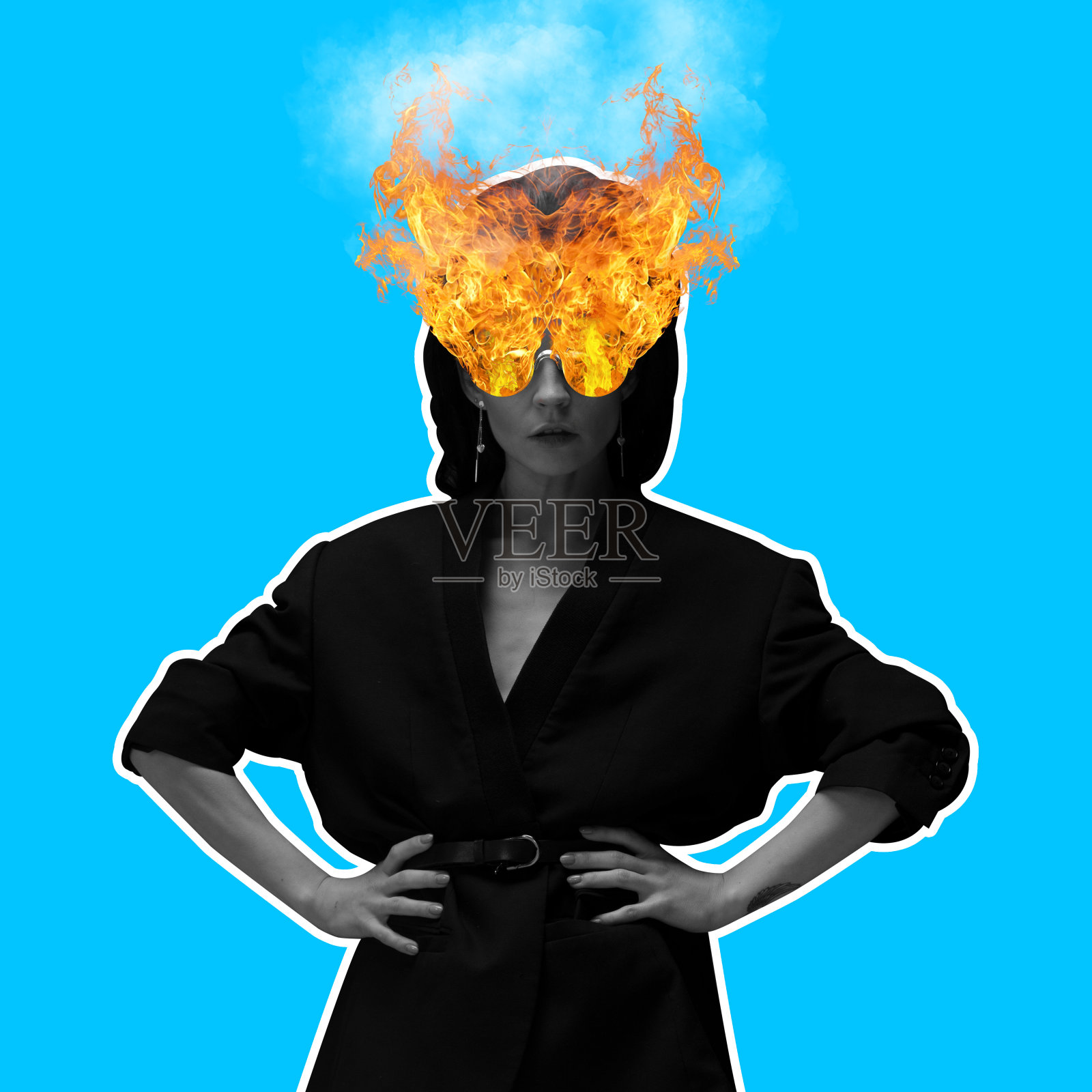 年轻时尚模特的创意形象在燃烧的眼镜与火。当代艺术拼贴。照片摄影图片