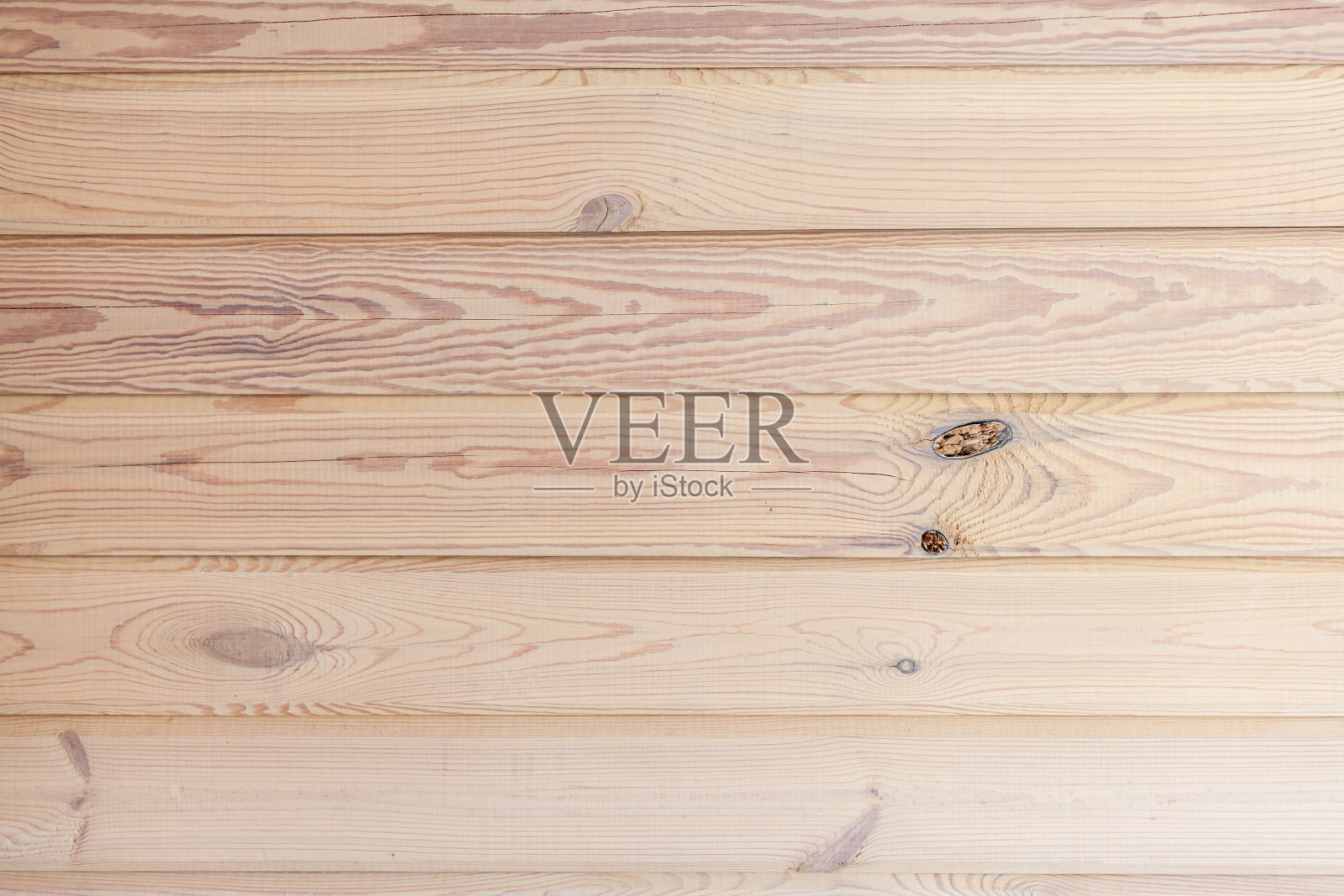 背景是一堵由木梁构成的墙。您的设计纹理照片摄影图片