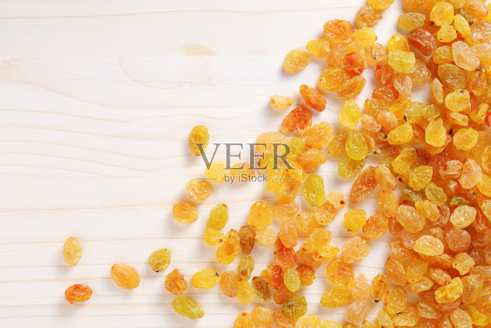 金色的无核葡萄干照片摄影图片