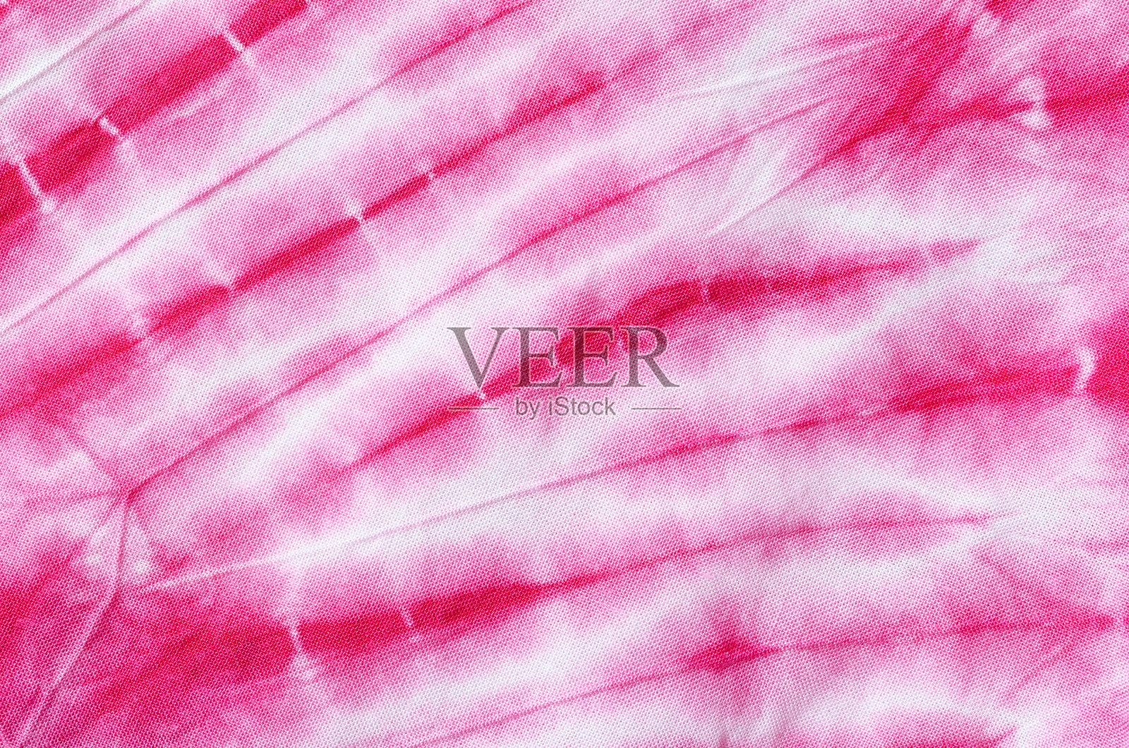 粉红色蜡染布纹理背景照片摄影图片
