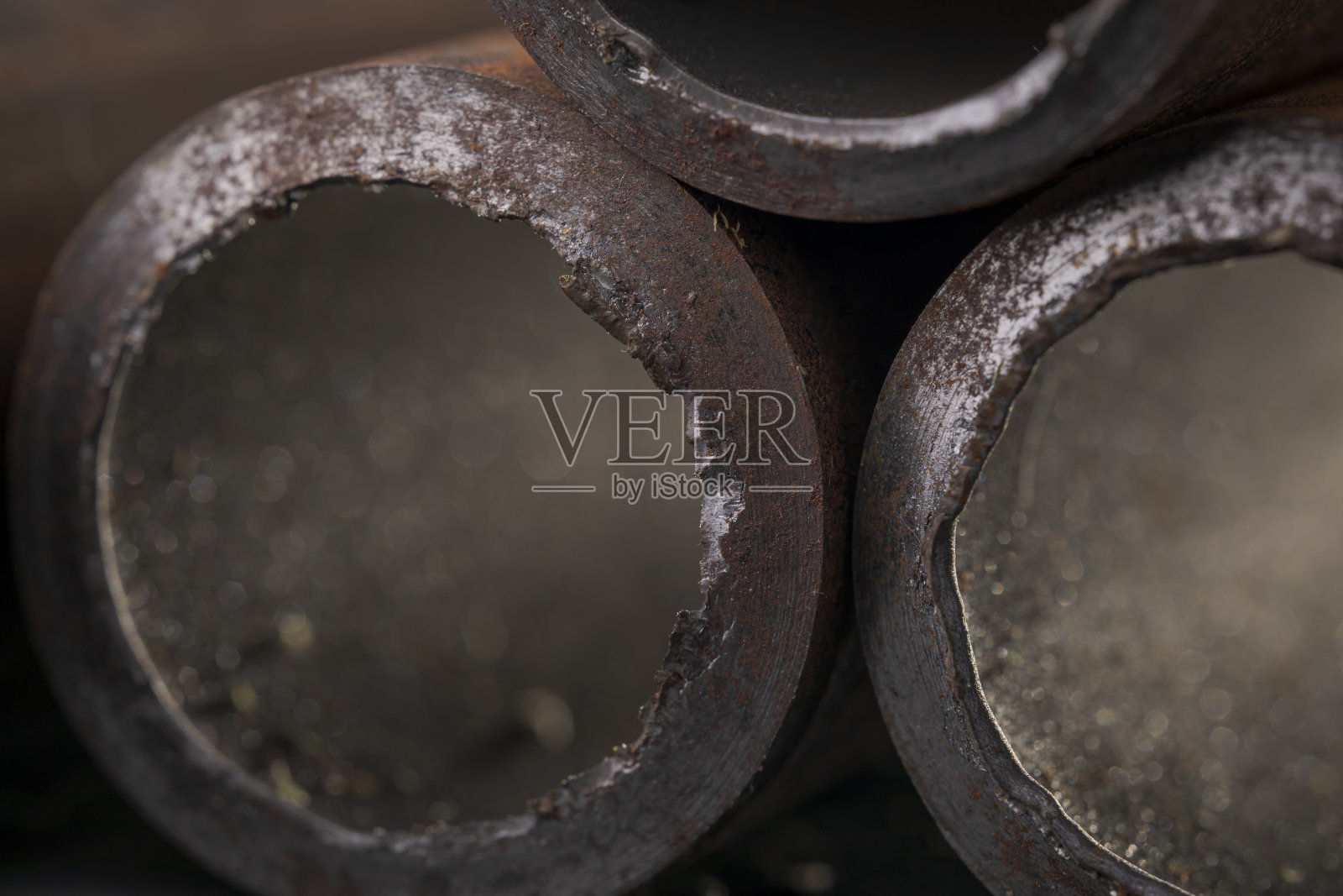 生锈的金属管道碎片的背景照片摄影图片