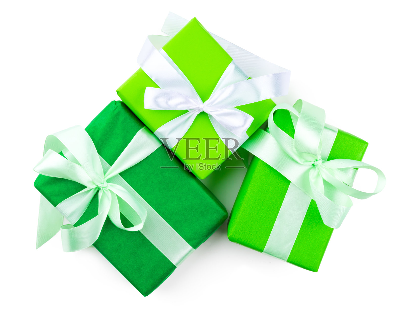 顶视图的三个美丽的礼物孤立在白色的背景照片摄影图片