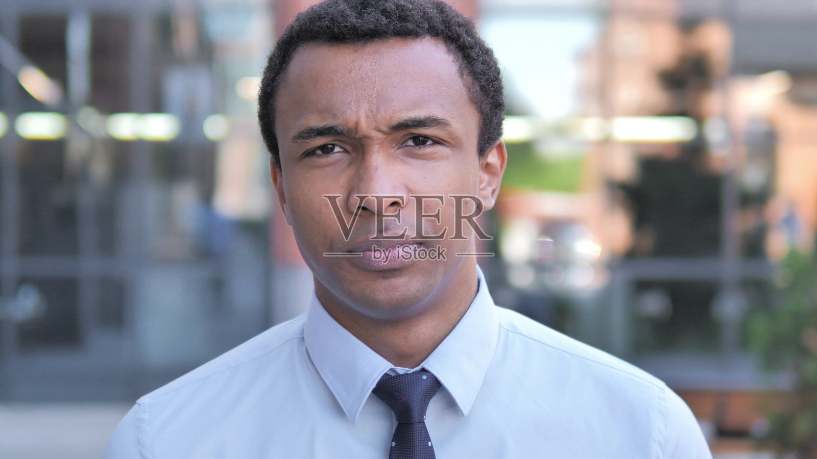 伤心的非洲商人肖像照片摄影图片