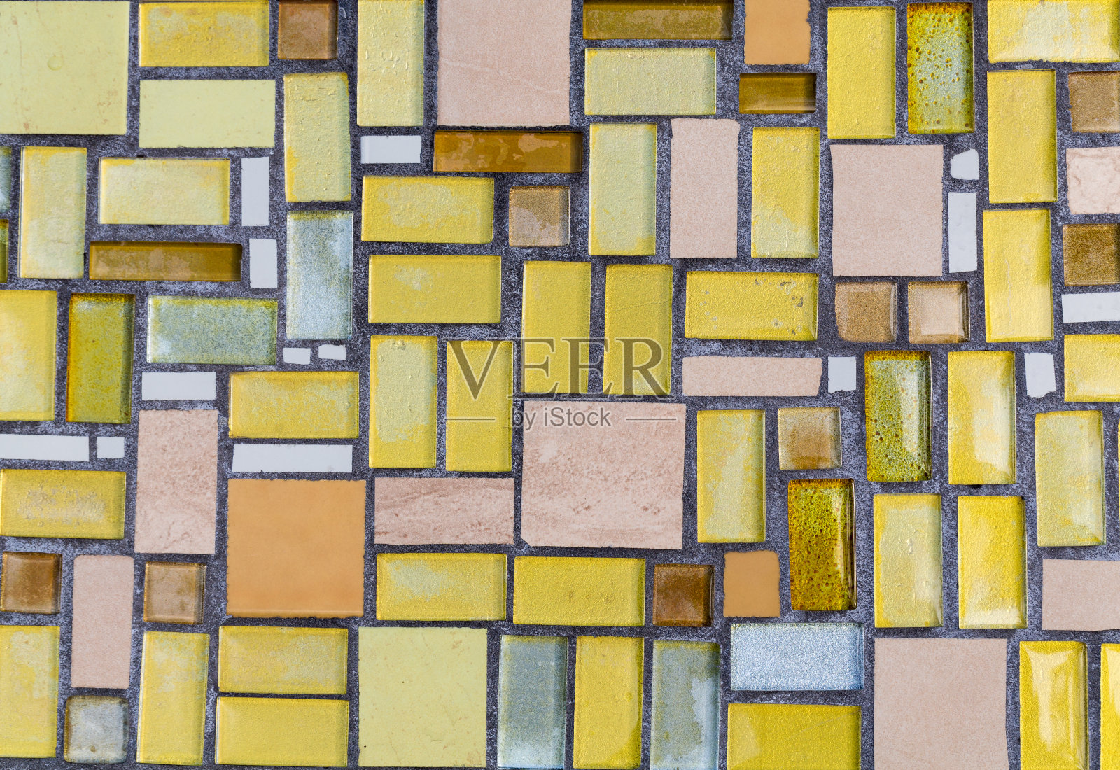 彩色马赛克墙面，抽象的玻璃背景。照片摄影图片