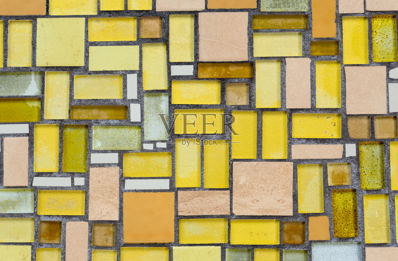 彩色马赛克墙面，抽象的玻璃背景。照片摄影图片