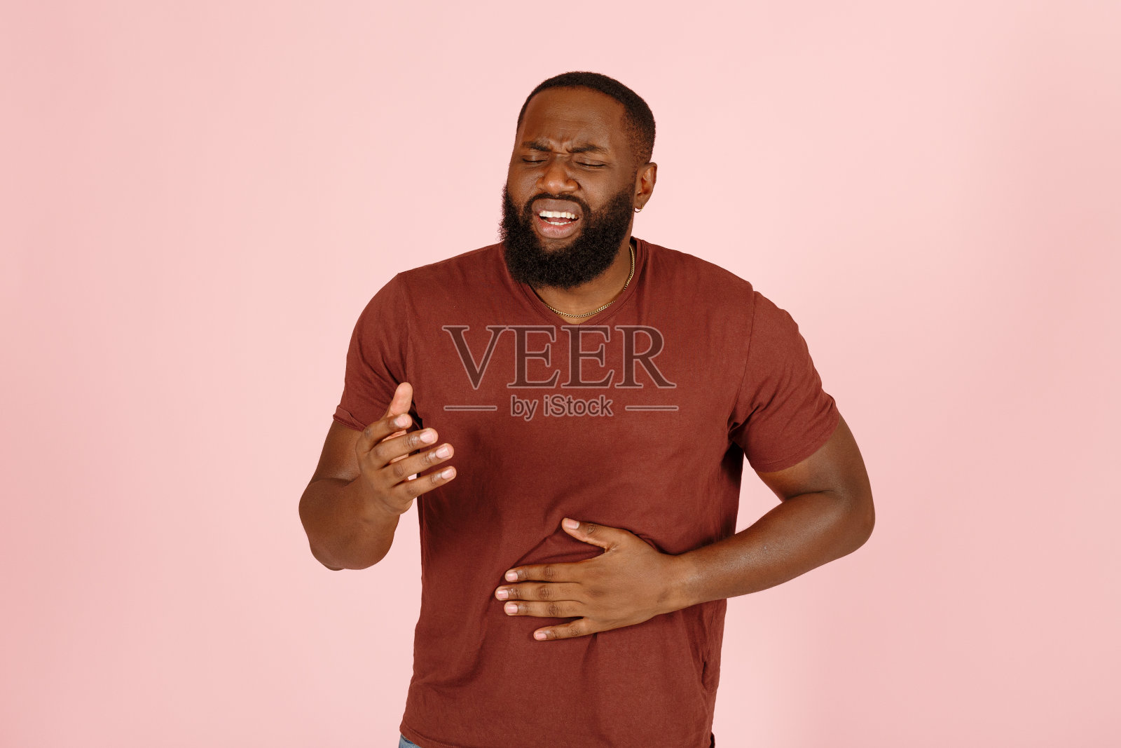 非裔美国人患有胃痛照片摄影图片