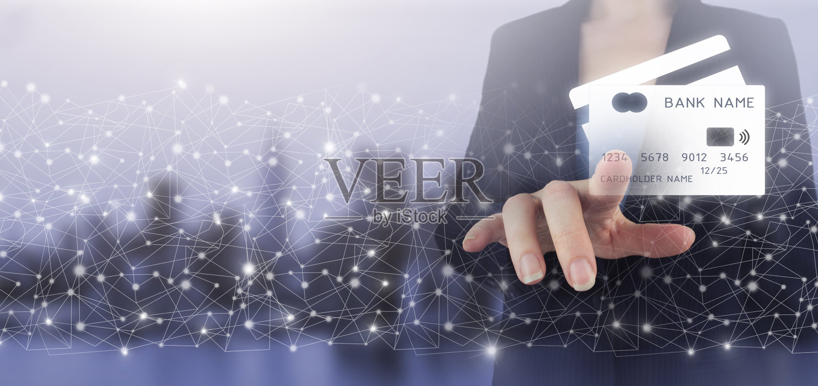 信用卡图标网络连接虚拟屏幕背景，业务技术。手触数字屏幕全息信用卡签上城市灯光模糊背景。在线支付数字照片摄影图片