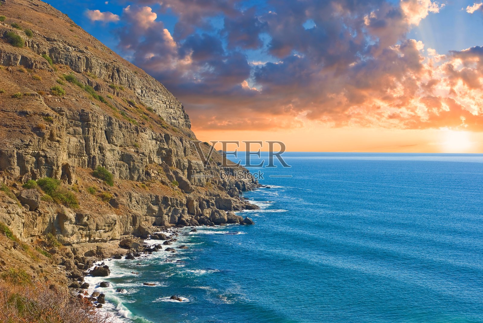 日落时的海岸照片摄影图片