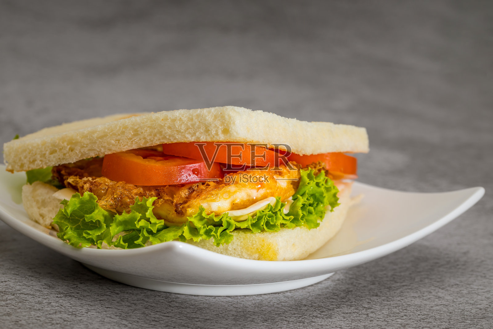 关门三明治煎蛋照片摄影图片