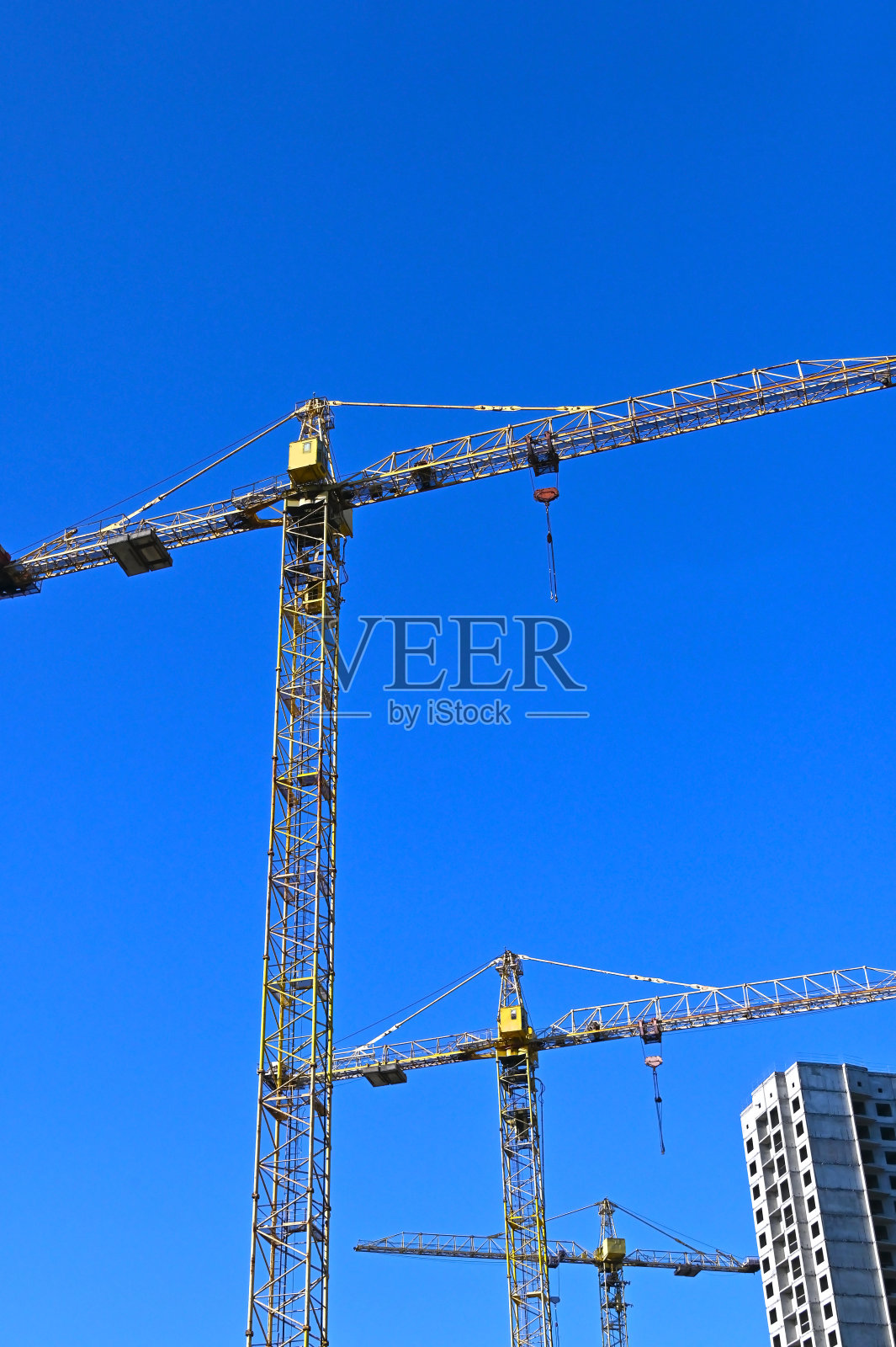 起重机及高层建筑工地照片摄影图片