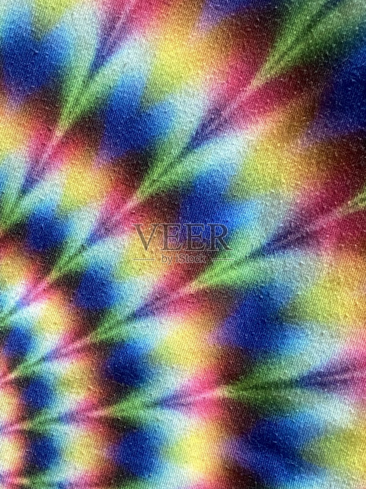 扎染鲜艳多彩的彩虹背景照片摄影图片