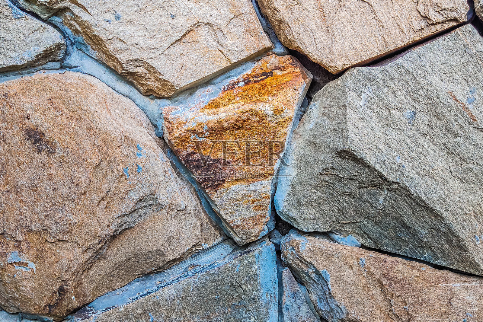 美丽的背景特写棕色的灰色石墙。非常适合用于设计和墙纸照片摄影图片