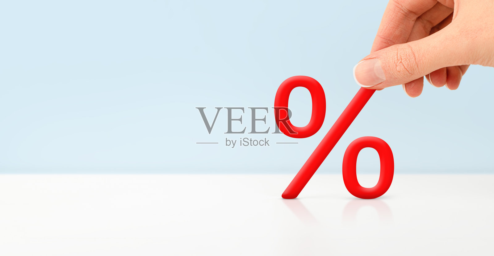 手握百分号照片摄影图片