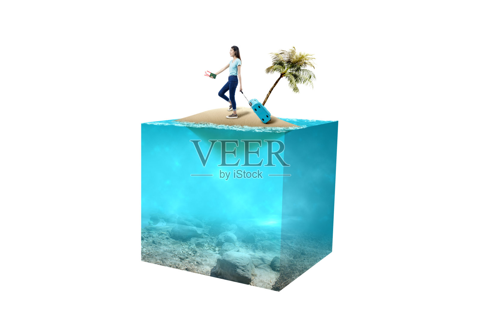 一个亚洲女人，拿着机票和护照的手提箱在一个小岛上照片摄影图片