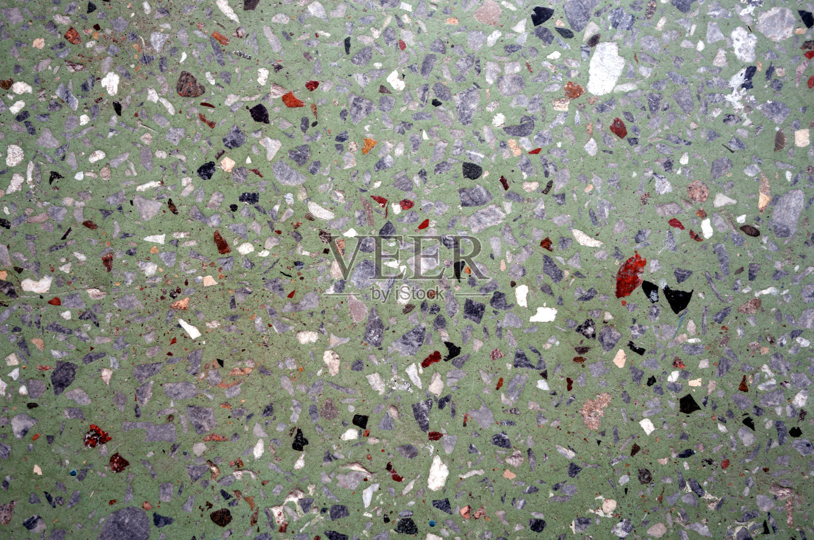 水泥板用小石子砌成照片摄影图片