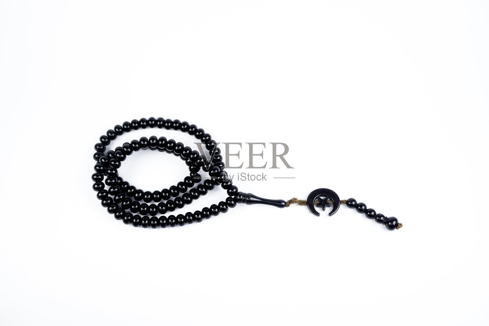 白色背景上黑色的念珠照片摄影图片