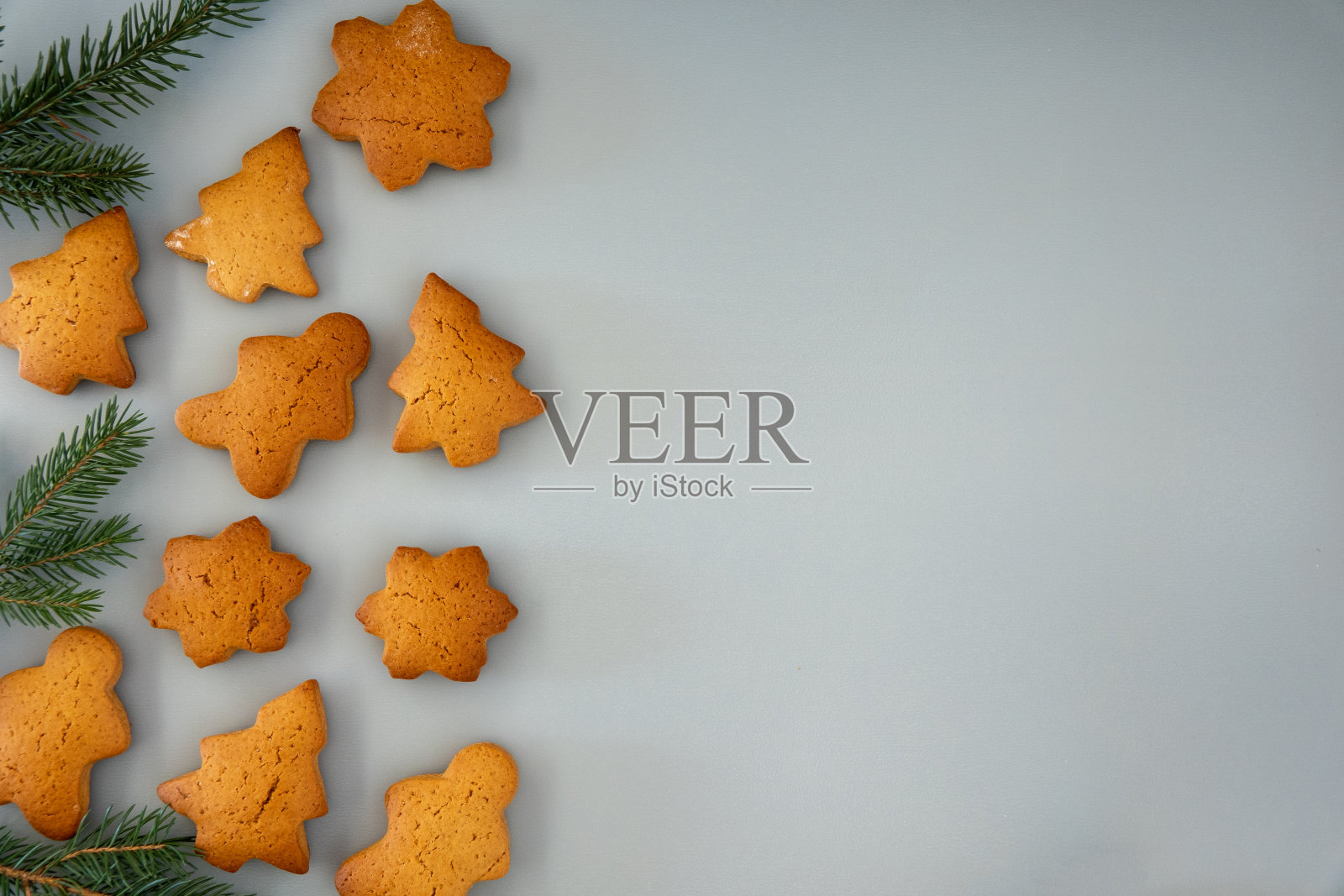 贺年姜饼套从姜饼釉面糖霜装饰黑色背景，最小的季节性流行病冬季假日横幅照片摄影图片