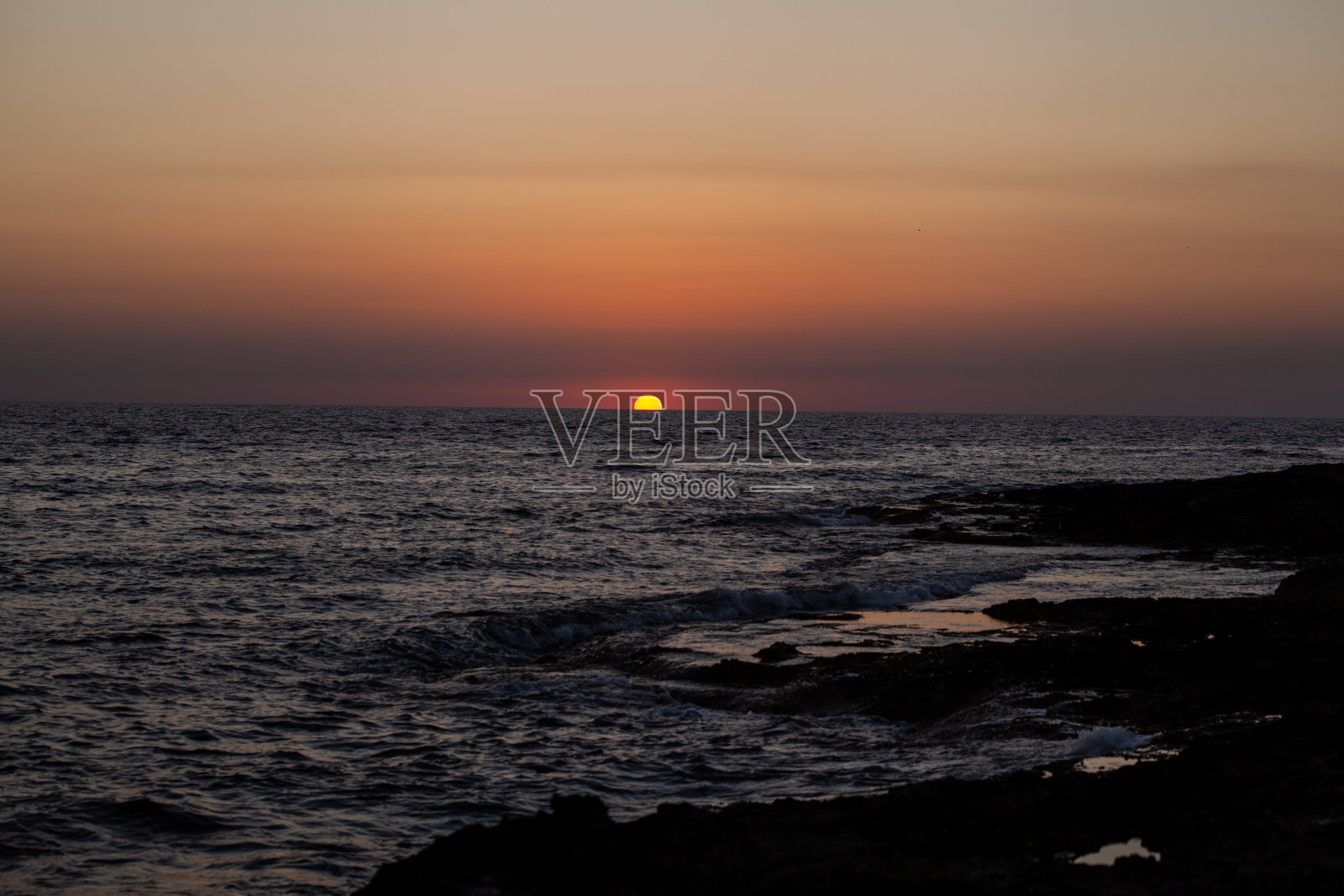 帕福斯海上的日落照片摄影图片