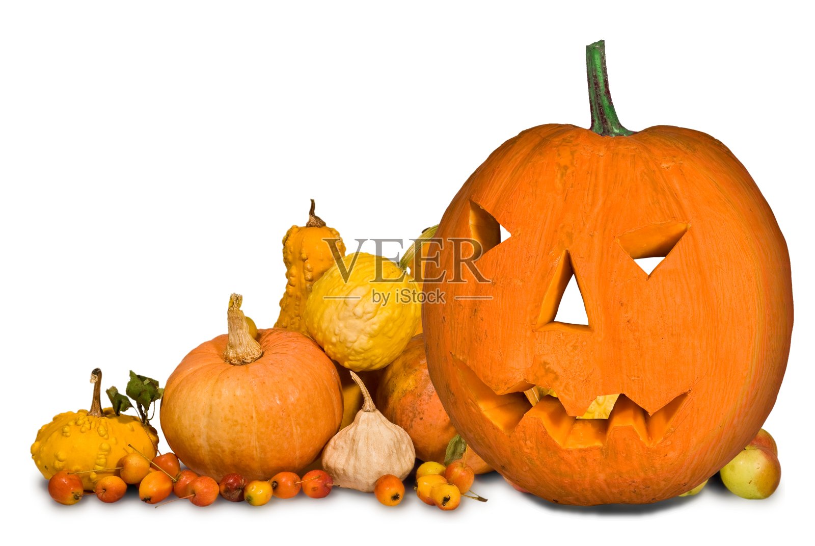 在白色背景上雕刻万圣节南瓜照片摄影图片