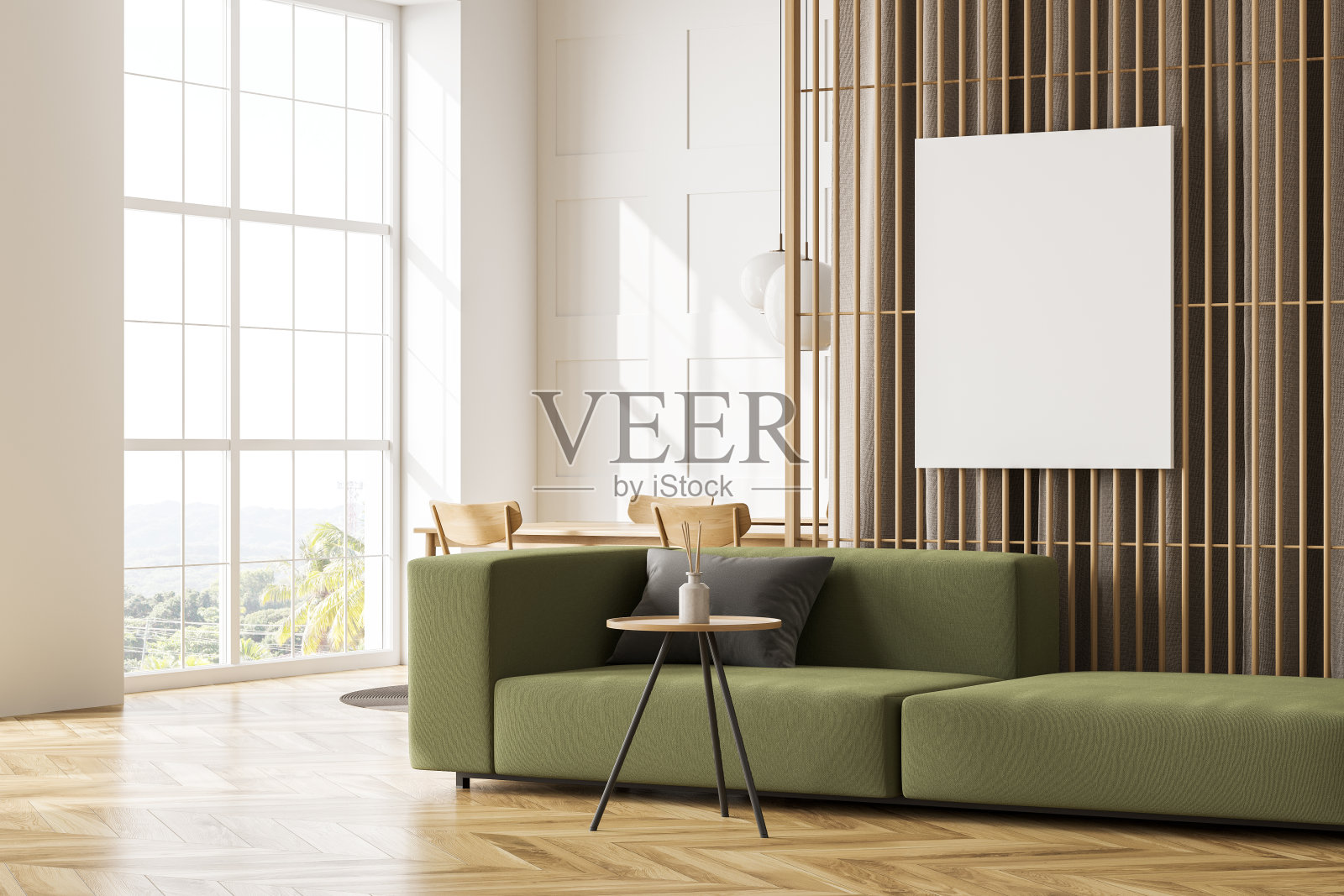 白色和绿色客厅隔断上的空画布。角落里的观点。照片摄影图片