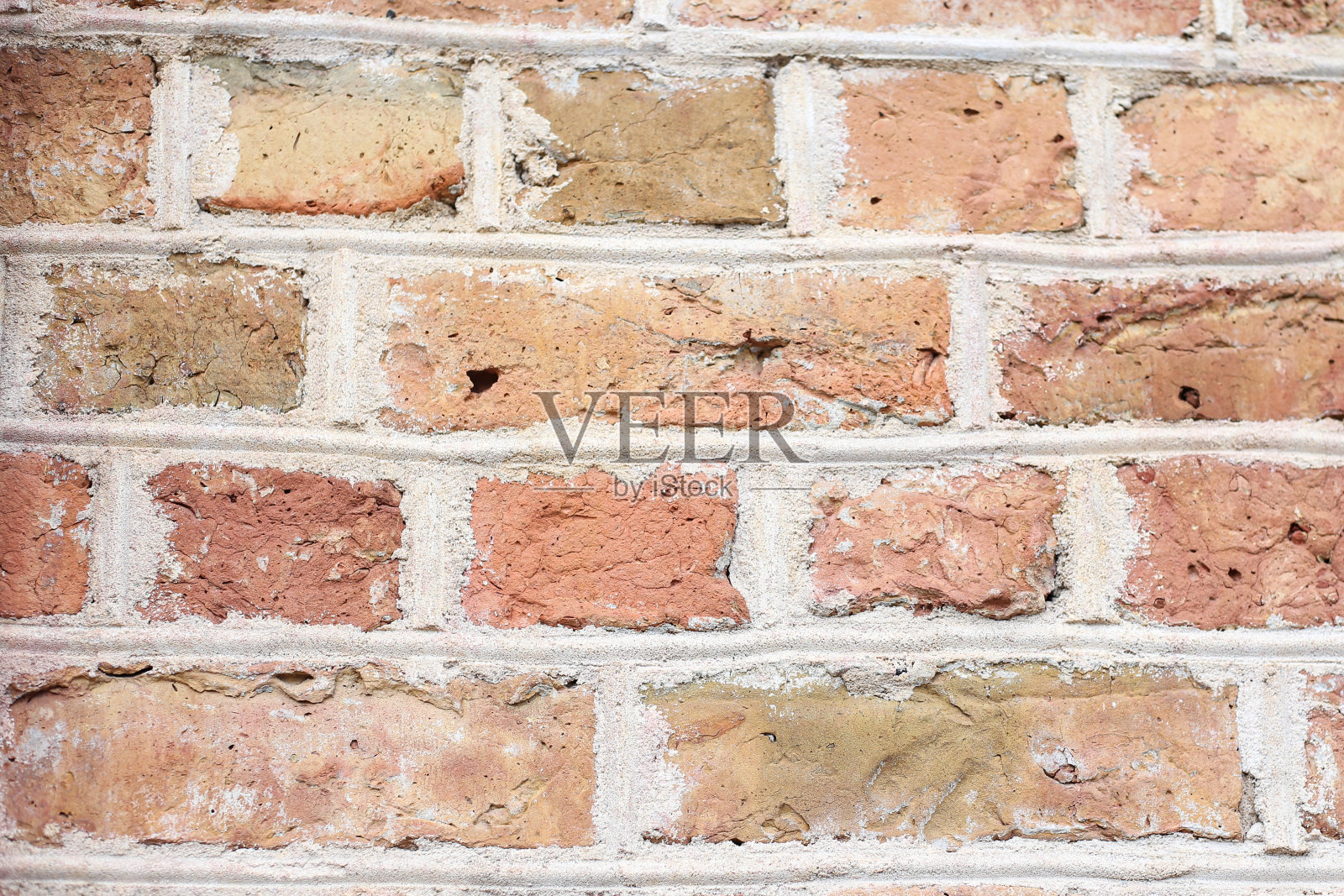 橙色房屋砖墙纹理背景与小细节。照片摄影图片