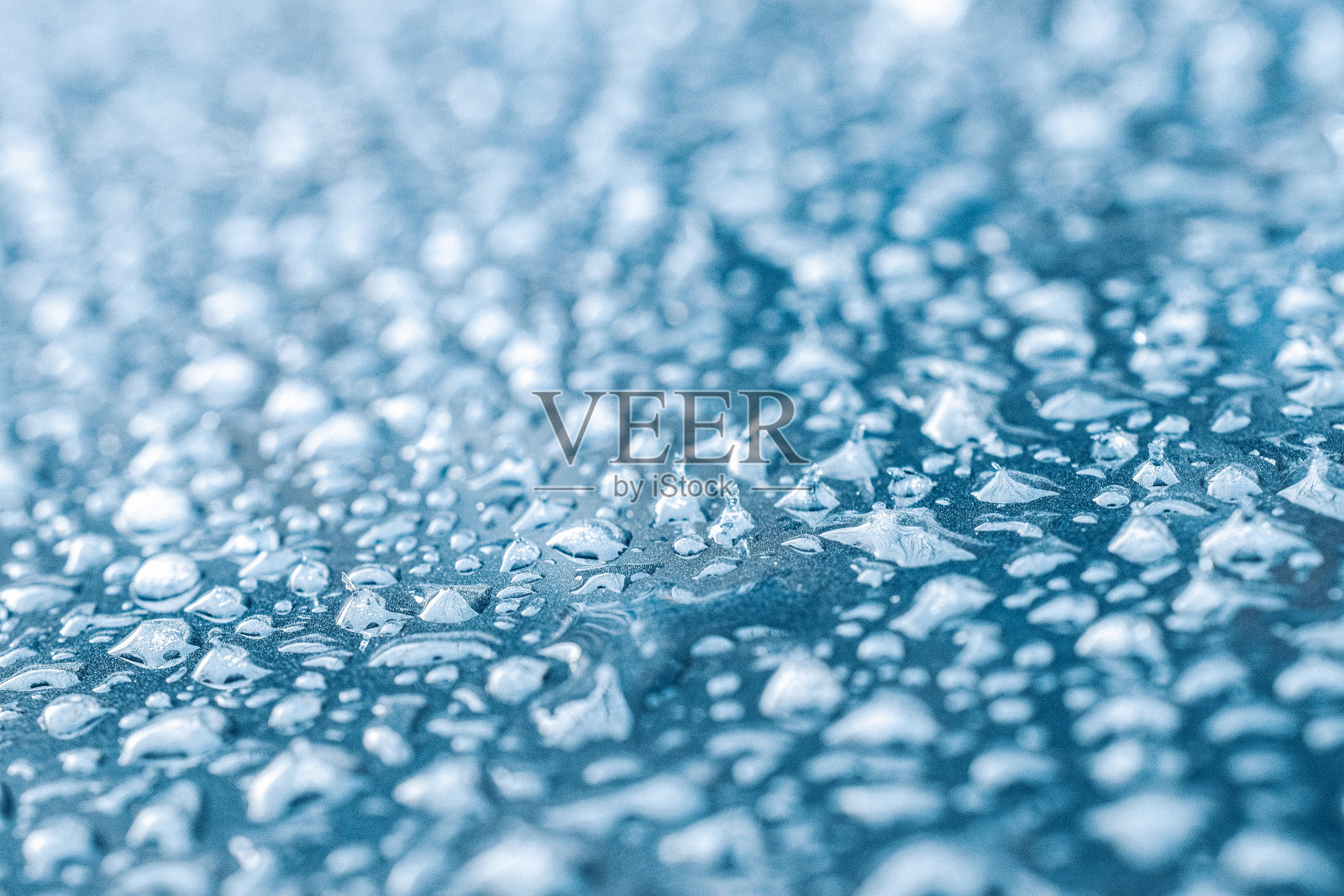 冷冻冰纹理。寒冷的冬季雪背景。蓝色水晶冻结抽象图案。白霜冰质。照片摄影图片