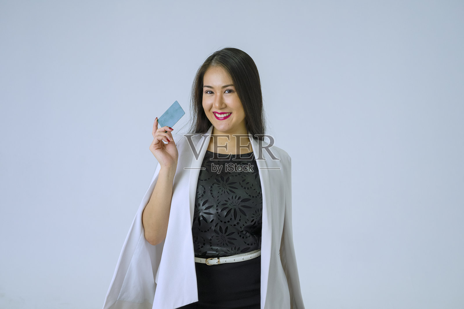 有信用卡的白领。照片摄影图片