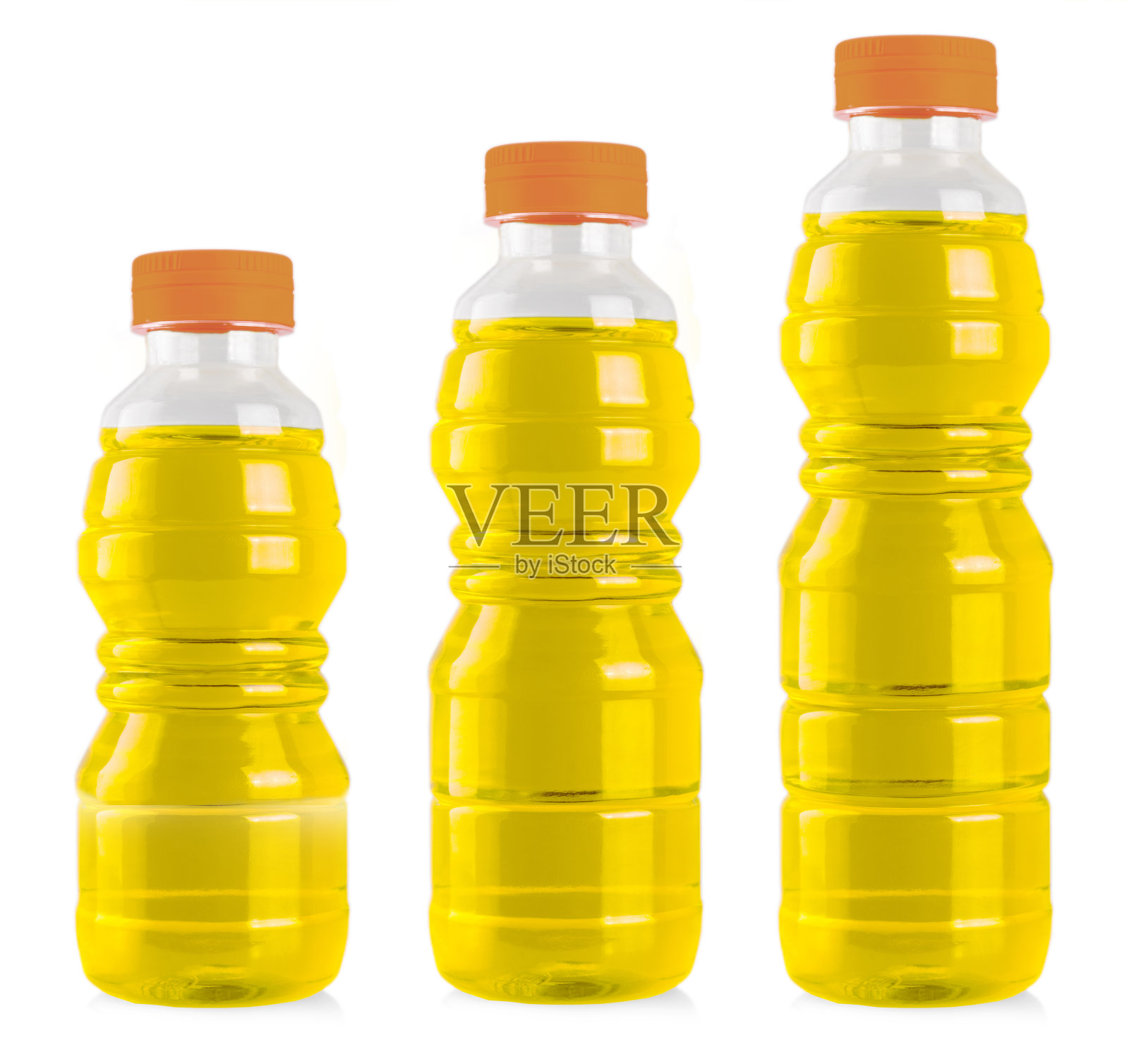 三瓶葵花籽油分离在白色背景上。照片摄影图片