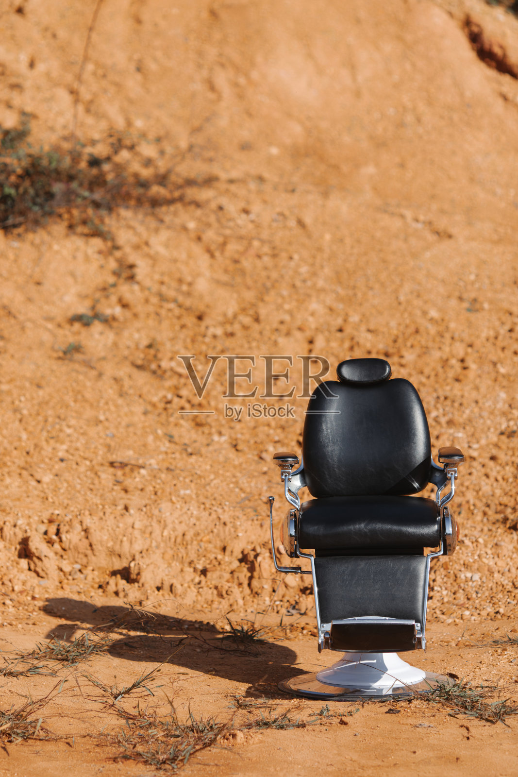 现场的理发椅。照片摄影图片