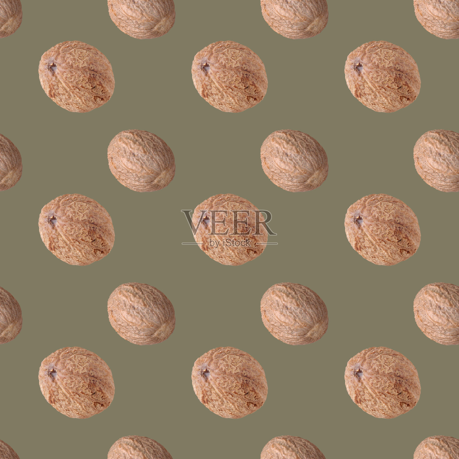 肉豆蔻在绿色背景无缝图案照片摄影图片