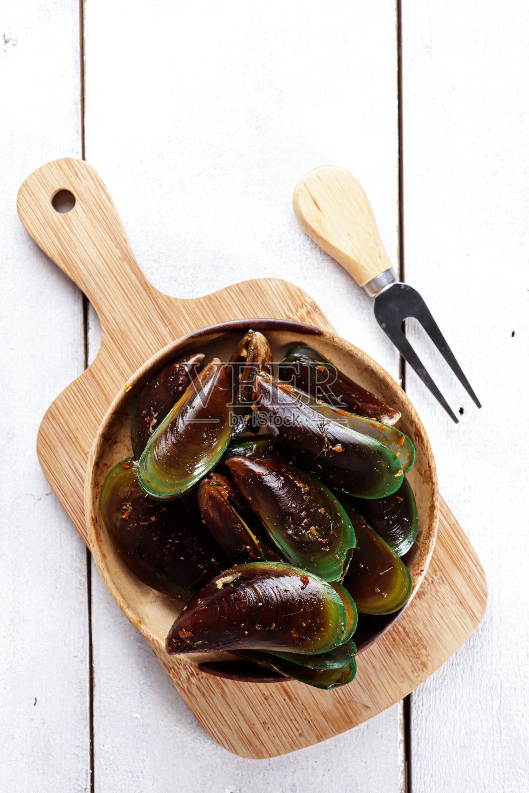 青贻贝甜酸汁。青贻贝配酸甜酱。照片摄影图片