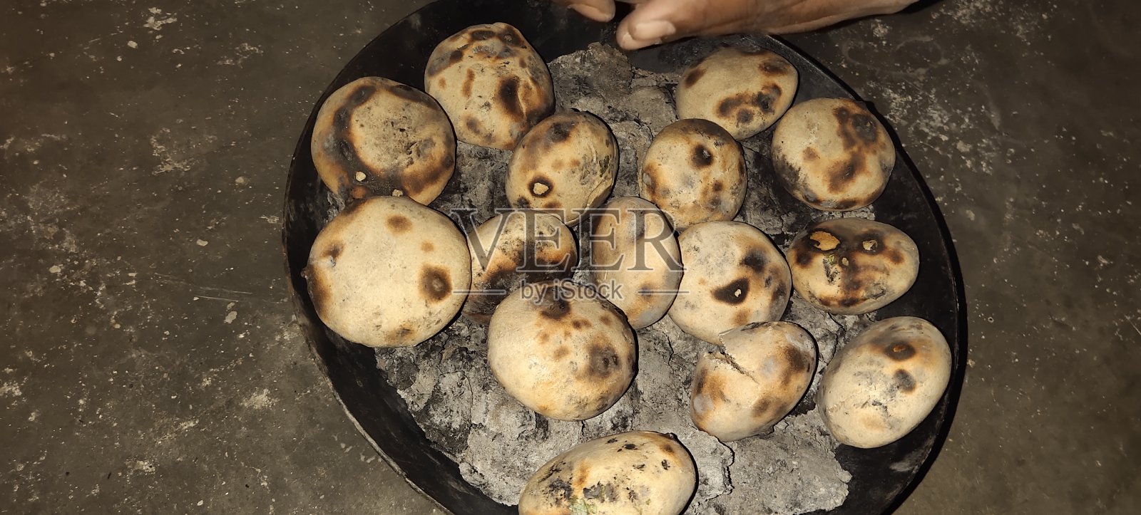 比哈尔邦食物礼仪乔卡是非常有考验的照片摄影图片