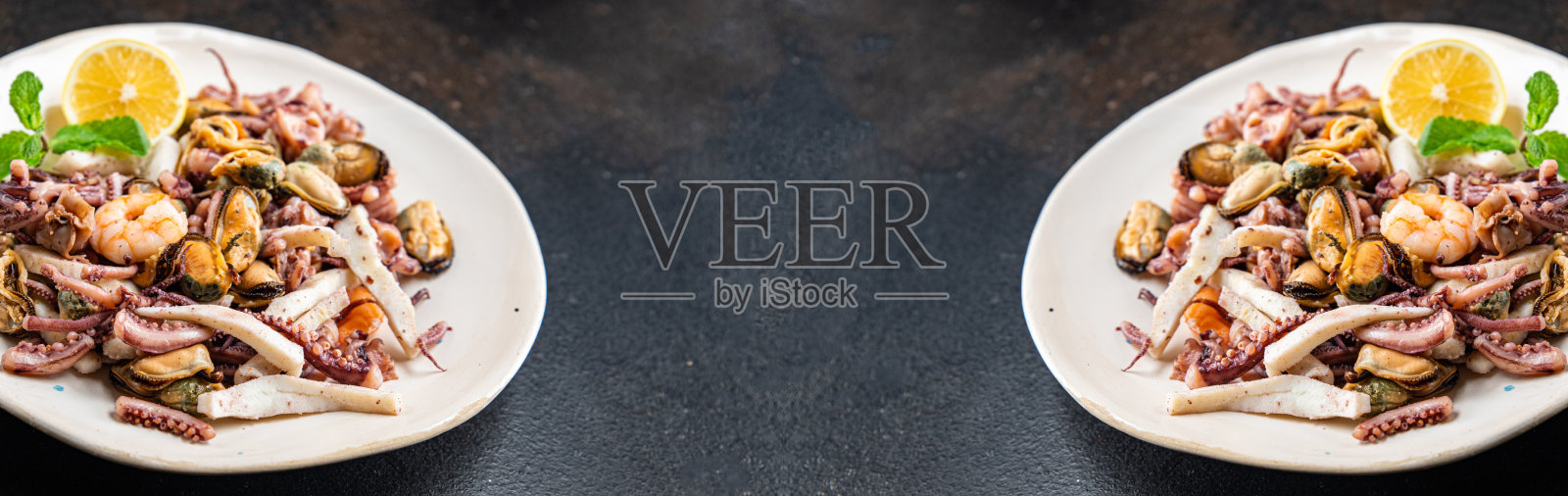 海鲜什锦虾仁、鱿鱼、贻贝、章鱼等ready - eat meal小吃在餐桌上复制空间的食物背景照片摄影图片