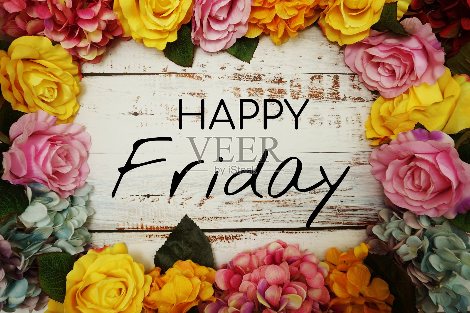 快乐星期五文本和花彩色边框木制背景照片摄影图片