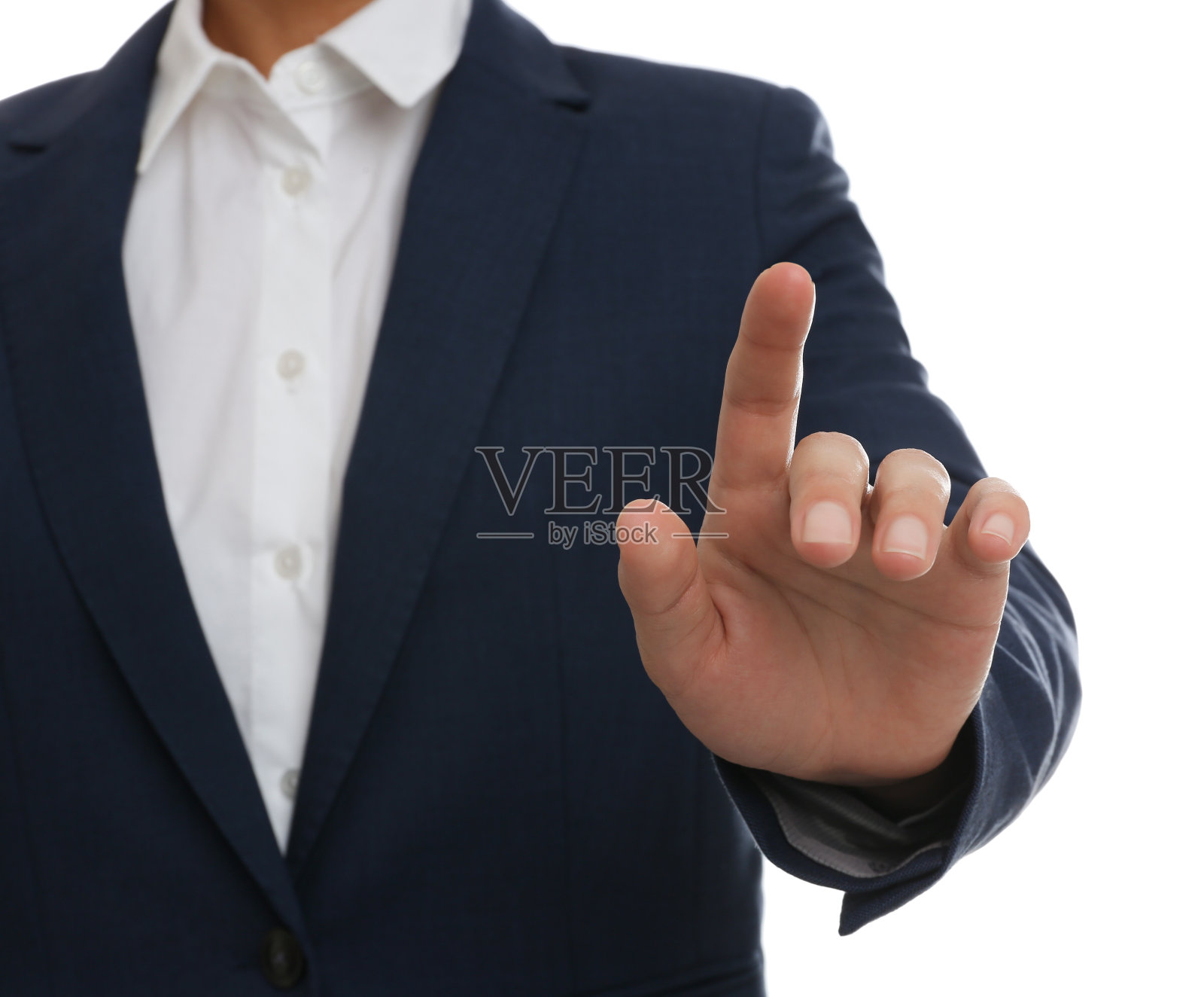 女人触摸白色背景的东西，集中在手上照片摄影图片