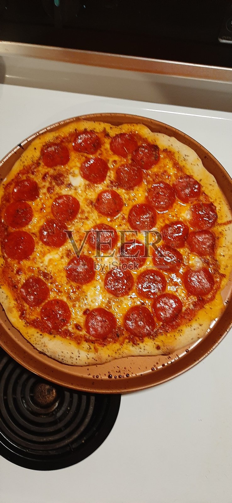 披萨在家里照片摄影图片