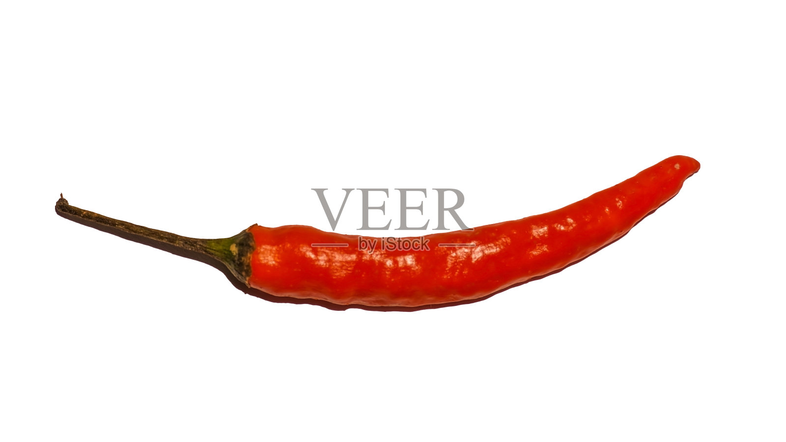 单辣辣椒分离在白色上。红辣椒的特写镜头。照片摄影图片