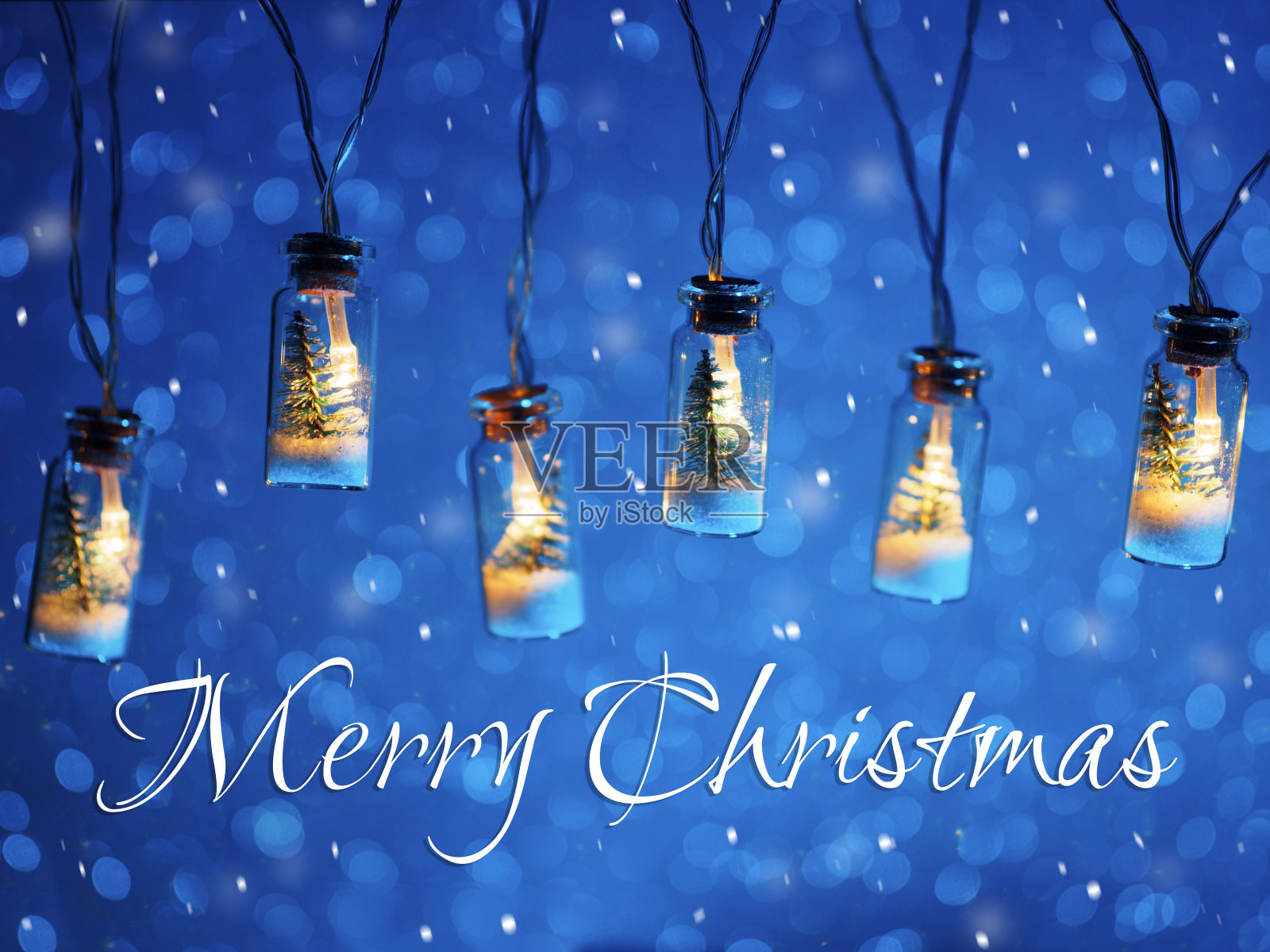 圣诞节散景蓝色背景贺卡照片摄影图片