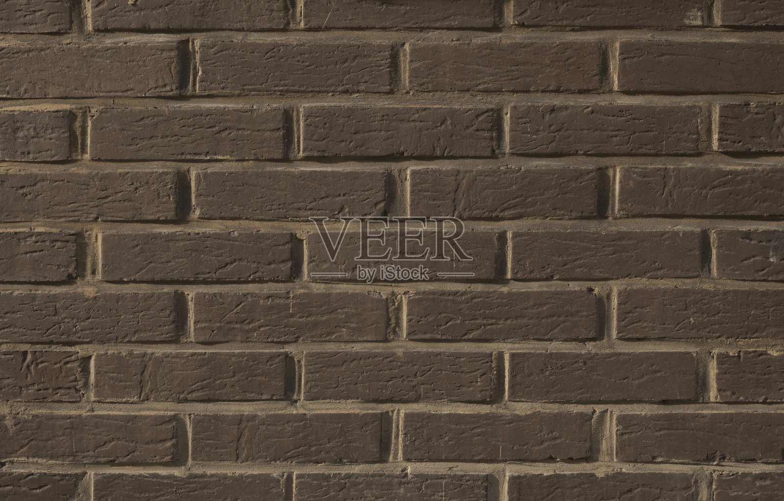 旧砖墙的纹理特写镜头。细节。背景的创造力。棕色软的颜色照片摄影图片