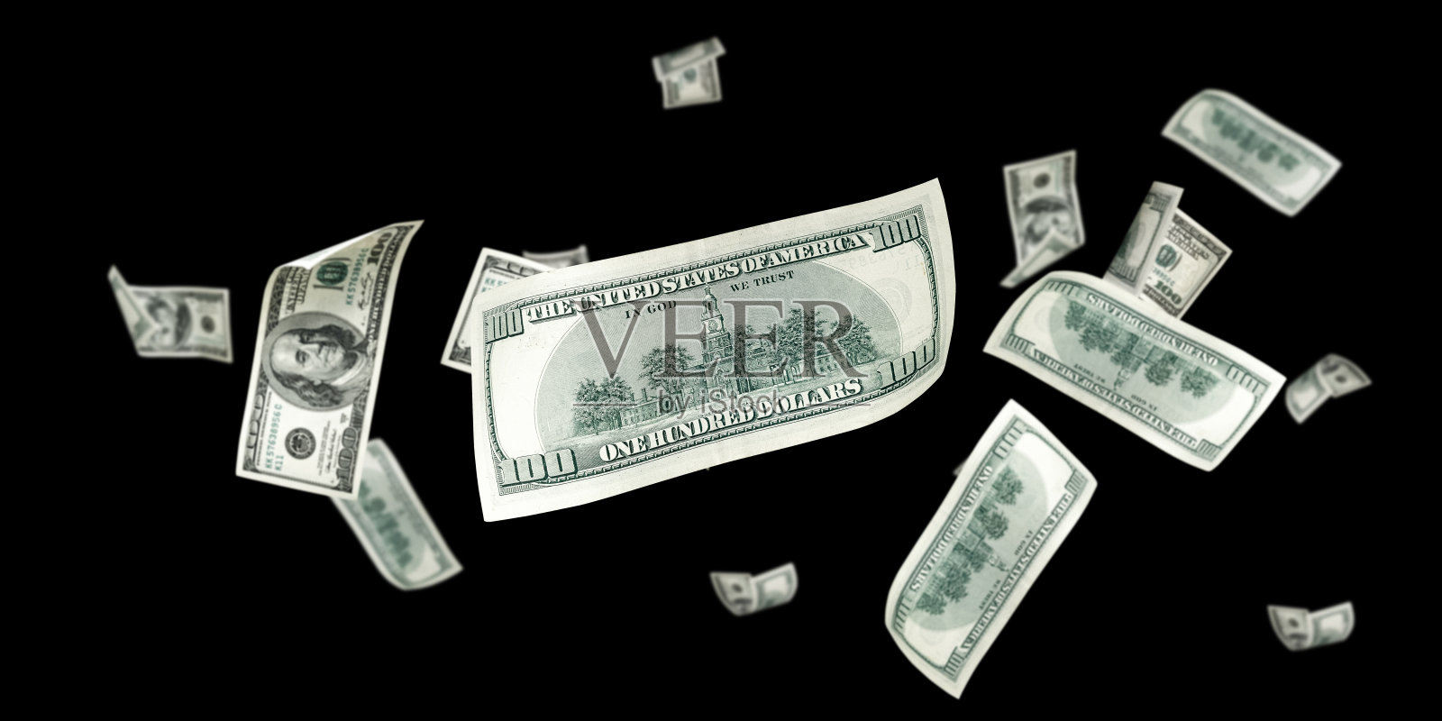 钱在下降。美国的钱。美国现金，美元背景。照片摄影图片