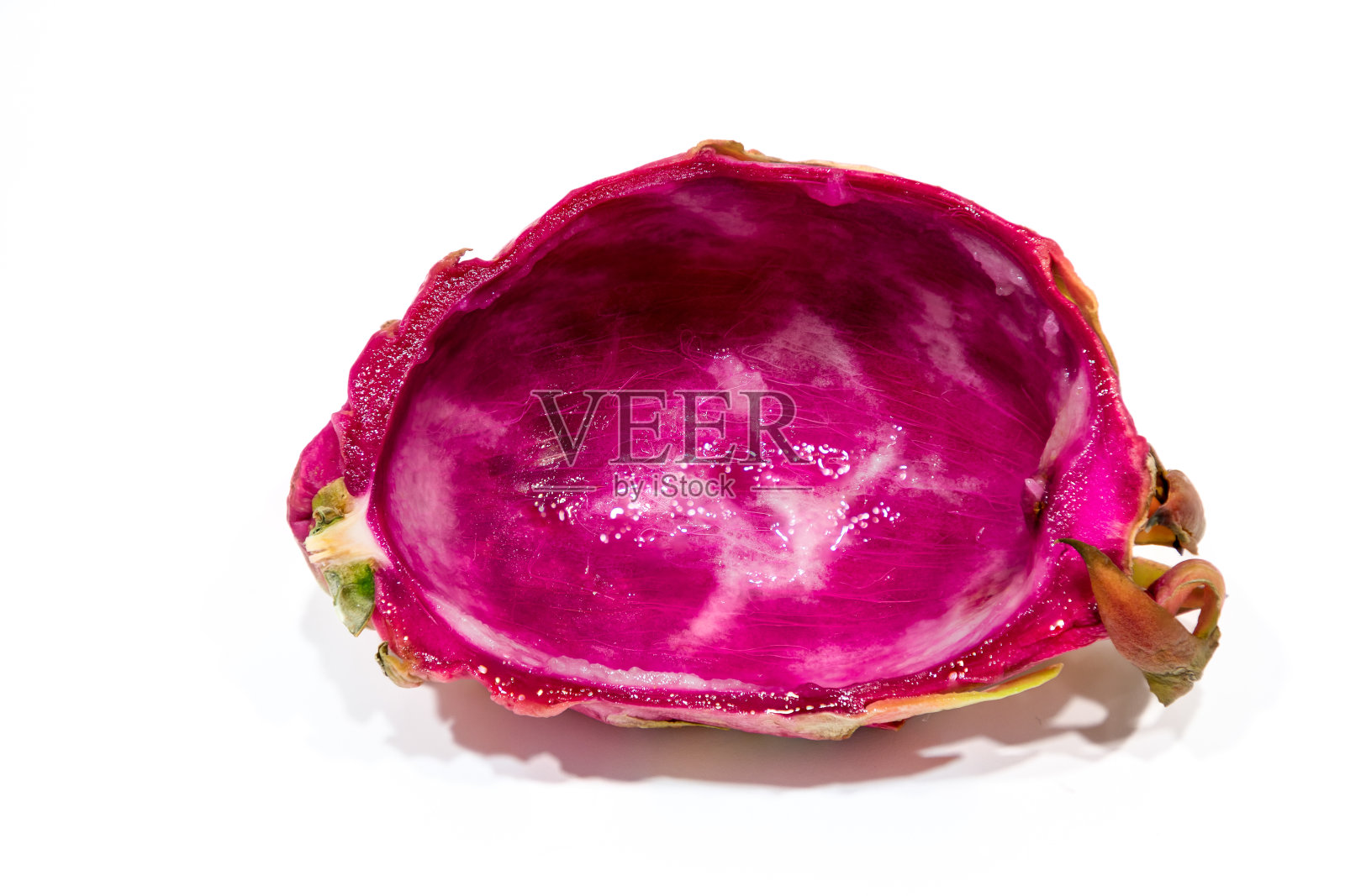 从马德里一家水果店买来的新鲜的pitahaya水果，马上就可以吃了照片摄影图片