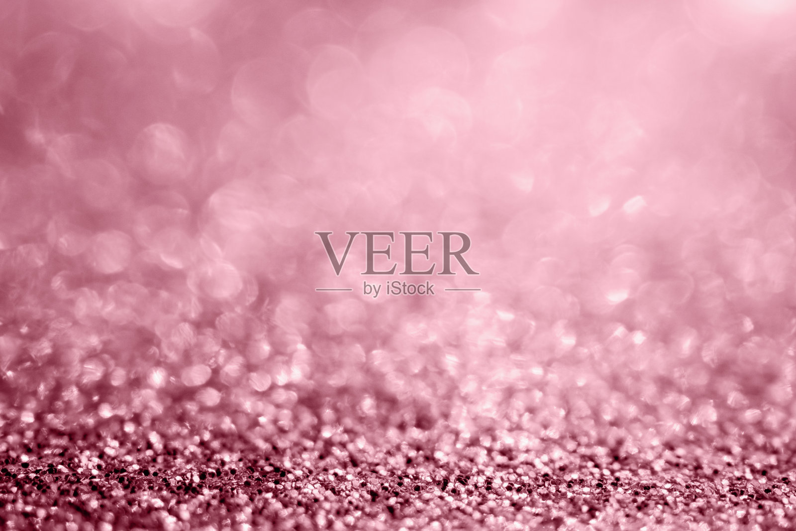 抽象的玫瑰金闪光纹理与散景背景照片摄影图片