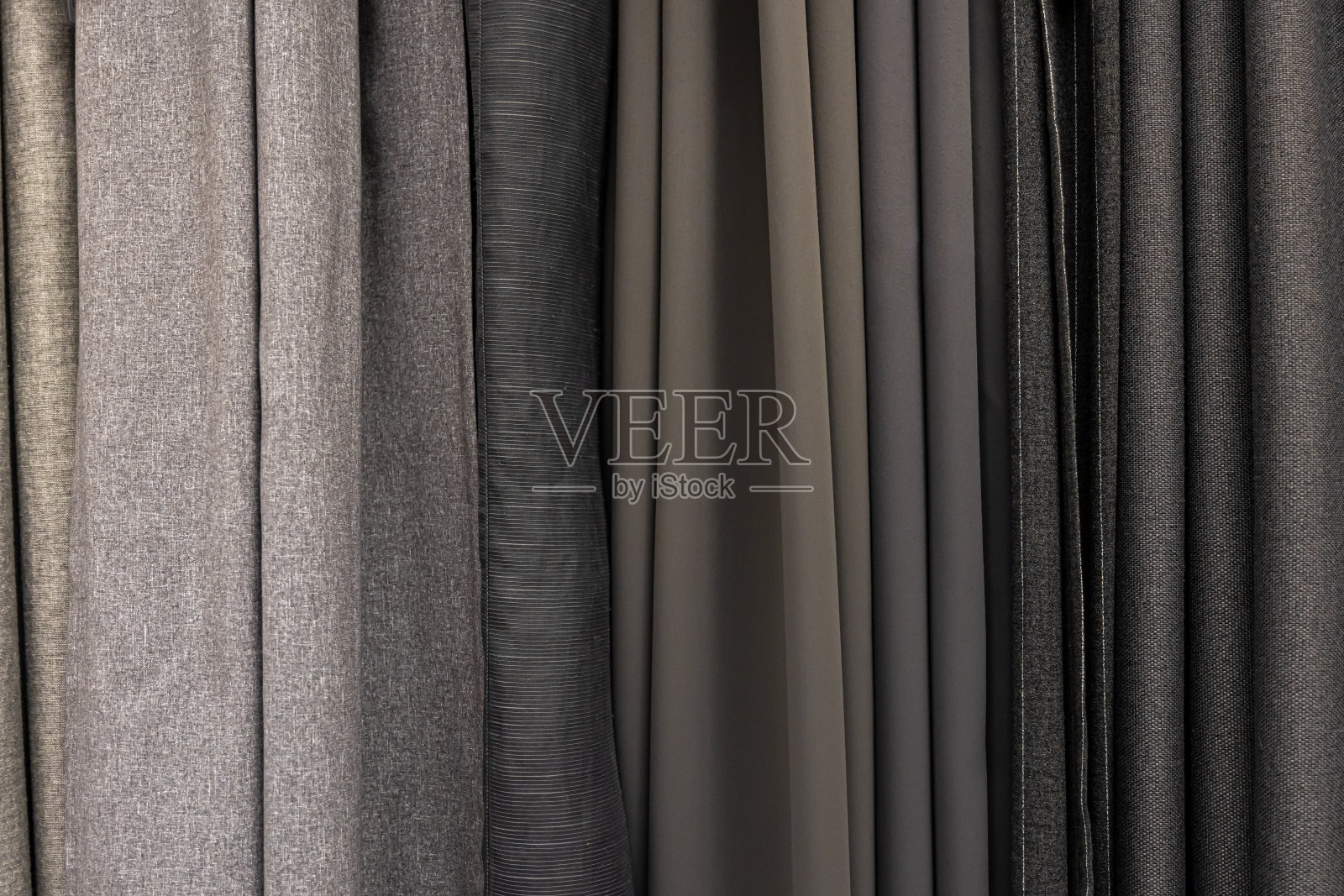 套灰色致密织物，质地均匀。照片摄影图片