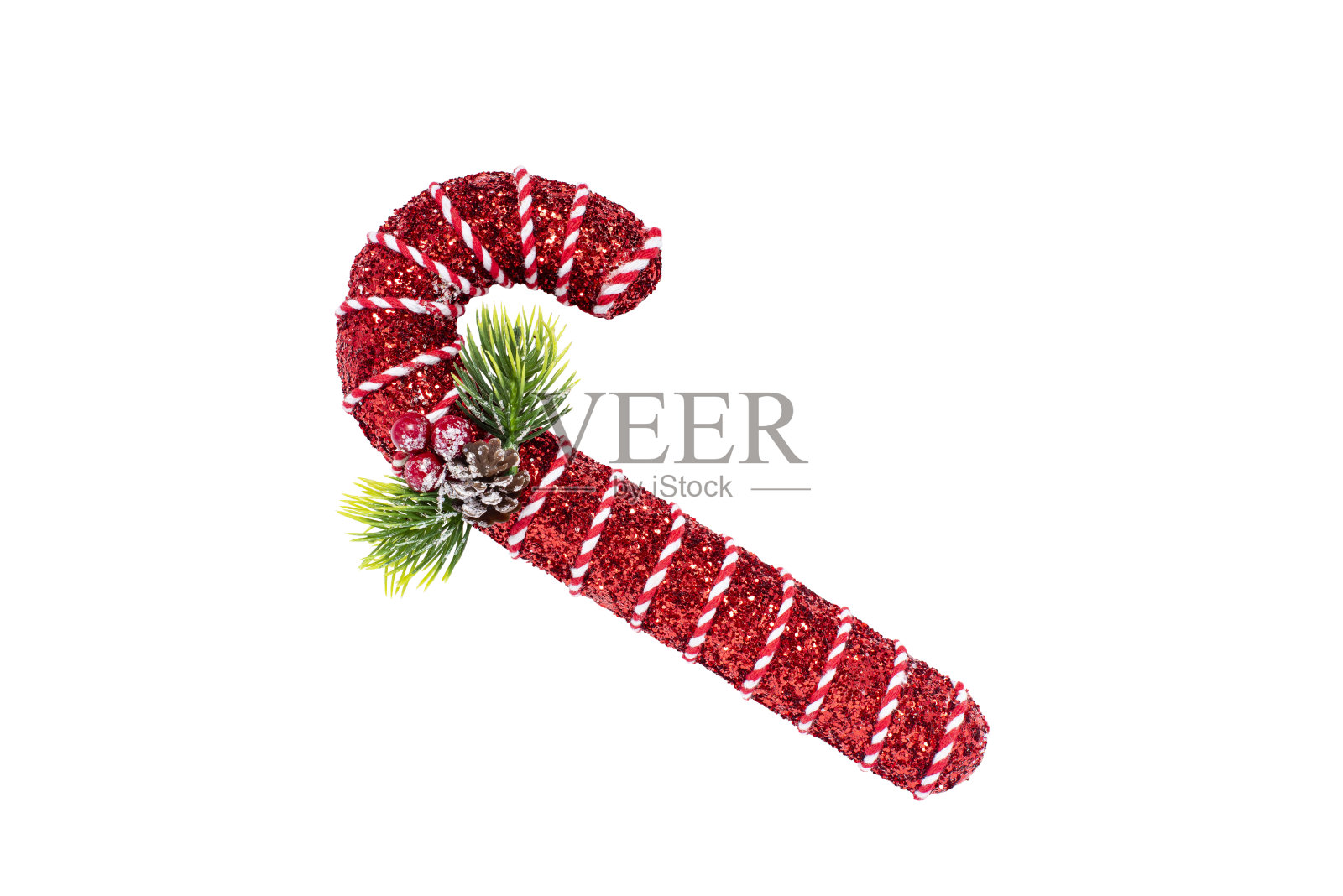 红色的糖果拐杖与冷杉枝作为圣诞装饰照片摄影图片
