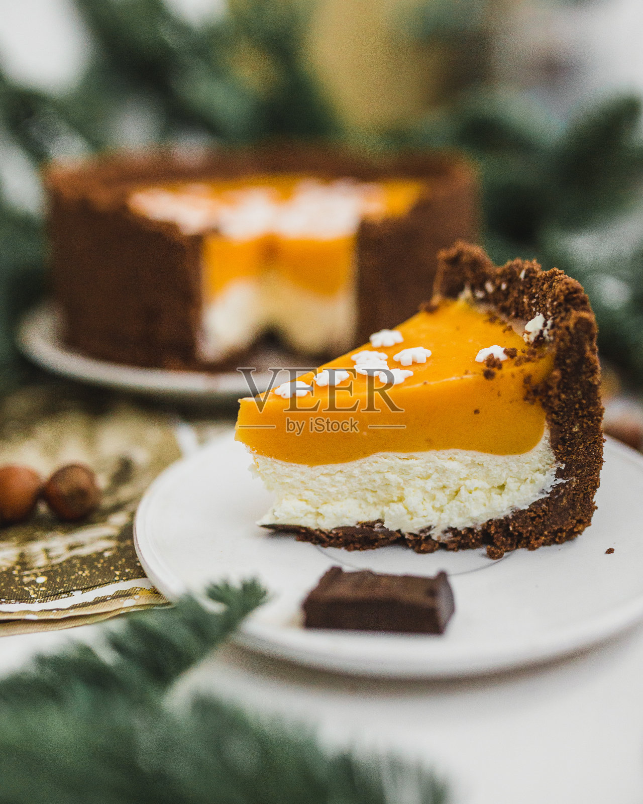 沙棘凝乳节日奶酪蛋糕。照片摄影图片