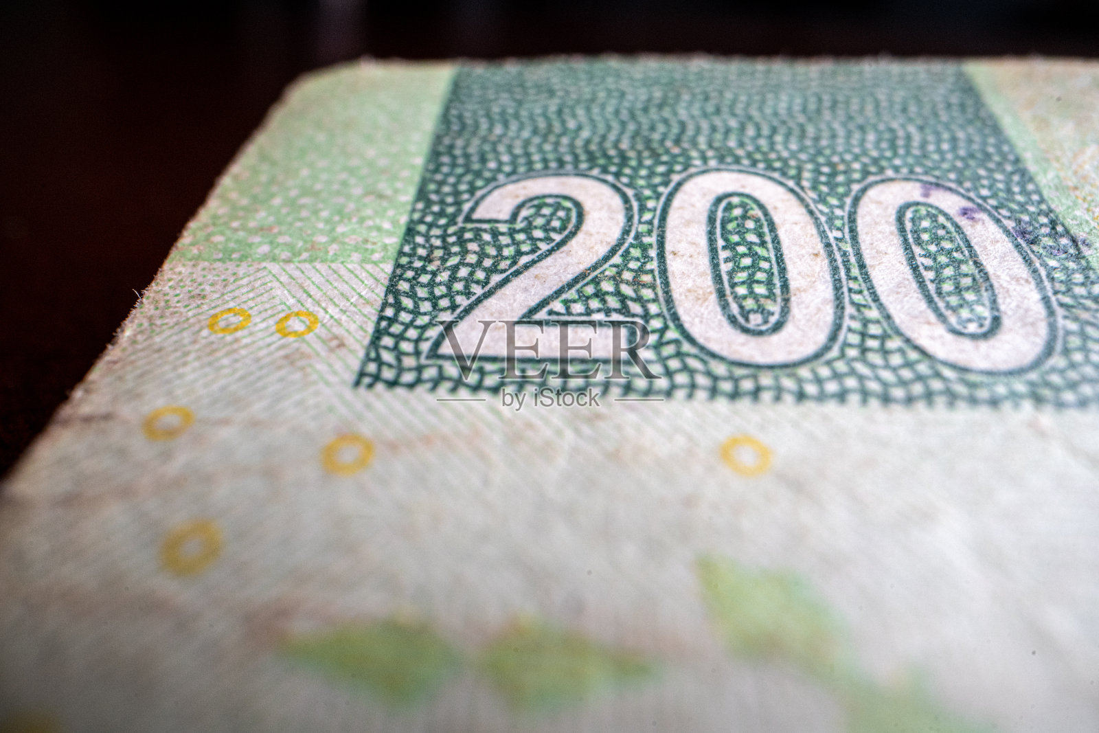 Doscientos 200比索钞票上的“200”特写照片摄影图片