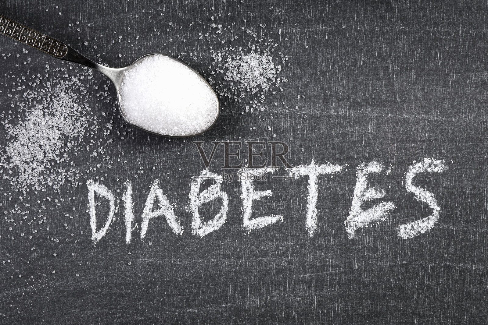 糖尿病加一茶匙白糖。粉笔文本照片摄影图片