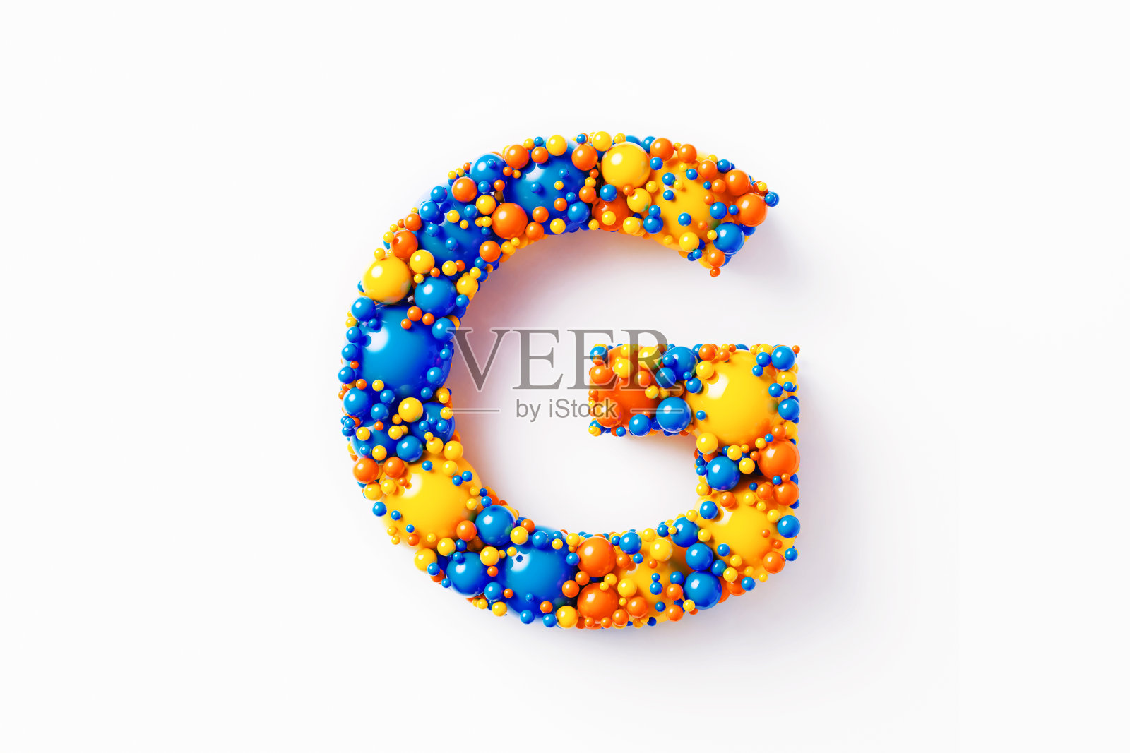 彩色大写字母G坐在白色背景上照片摄影图片