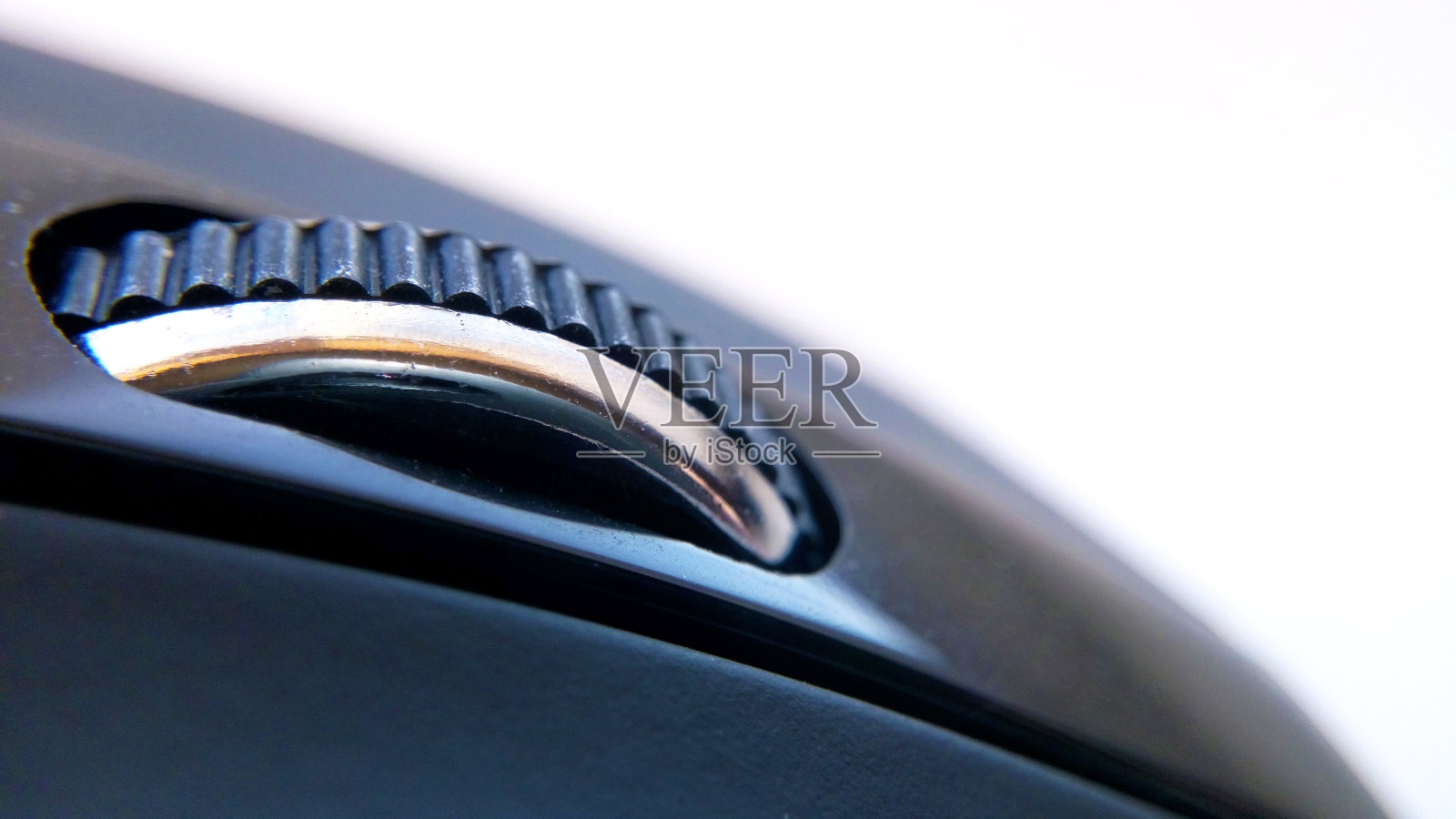 鼠标滚轮在白色背景上模糊背景照片摄影图片