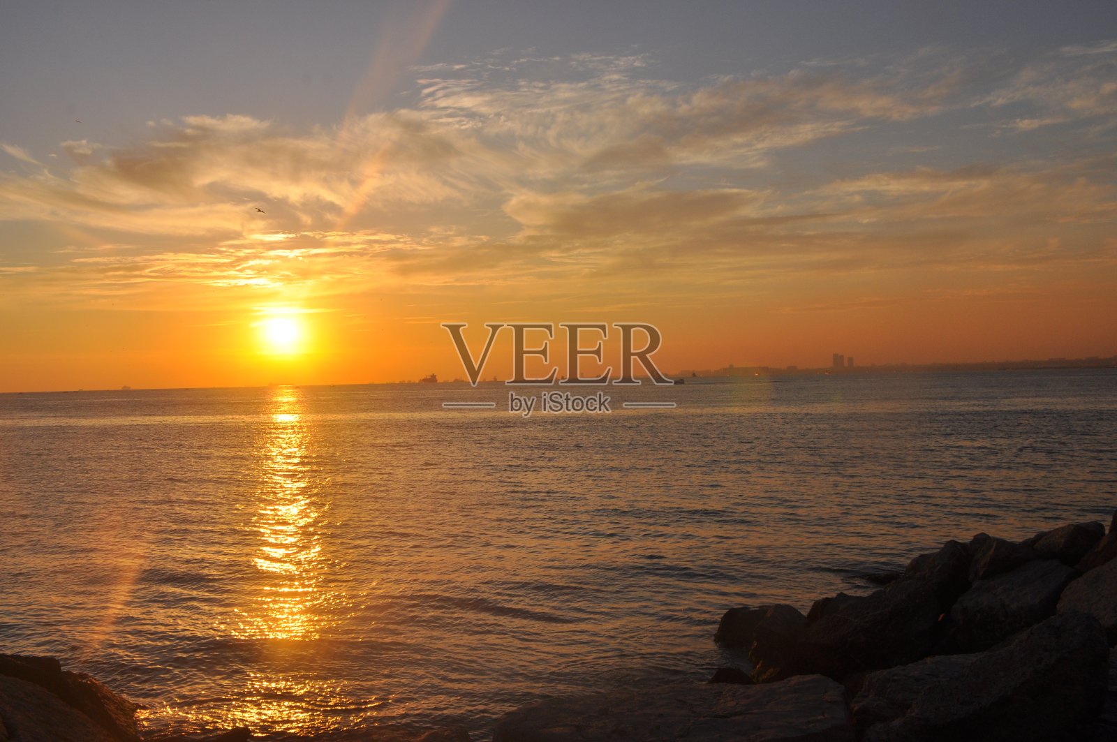 莫达海岸的日落照片摄影图片